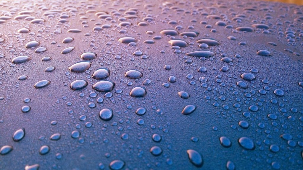 Blue Board With Water Dew Closeup Photography